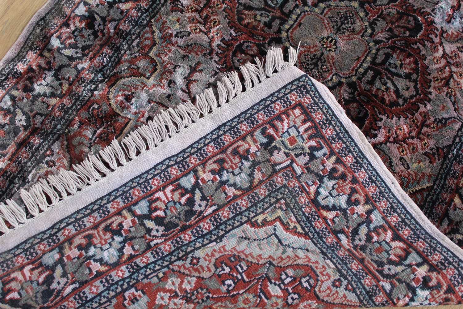Lot 83 - Eastern rug with floral decoration, 128cm x