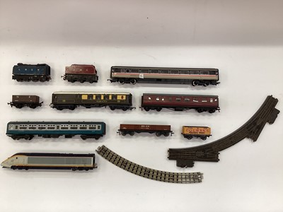 Lot 1884 - Four boxes of model railway items Railway- OO gauge unboxed selection to include locomotives and tenders, carriages and rolling stock, plus 3 rail track and accessories (4 boxes)