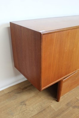 Lot 90 - Mid 20th century teak sideboard with three cupboards and four drawers, 206cm wide, 45.5cm deep, 79cm high
