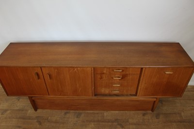 Lot 90 - Mid 20th century teak sideboard with three cupboards and four drawers, 206cm wide, 45.5cm deep, 79cm high