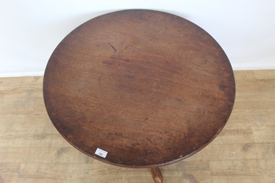 Lot 102 - Georgian mahogany circular wine table on turned coulumn and three splayed legs, 77cm diameter, 49cm high