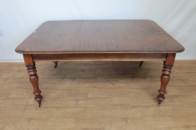 Lot 109 - Victorian mahogany extending dining table with one extra leaf on turned legs, 160cm x 115cm