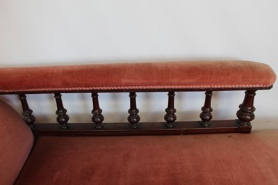 Lot 110 - Victorian mahogany framed chaise langue with pink upholstery on turned legs and castors, 194cm wide approx, 74cm high