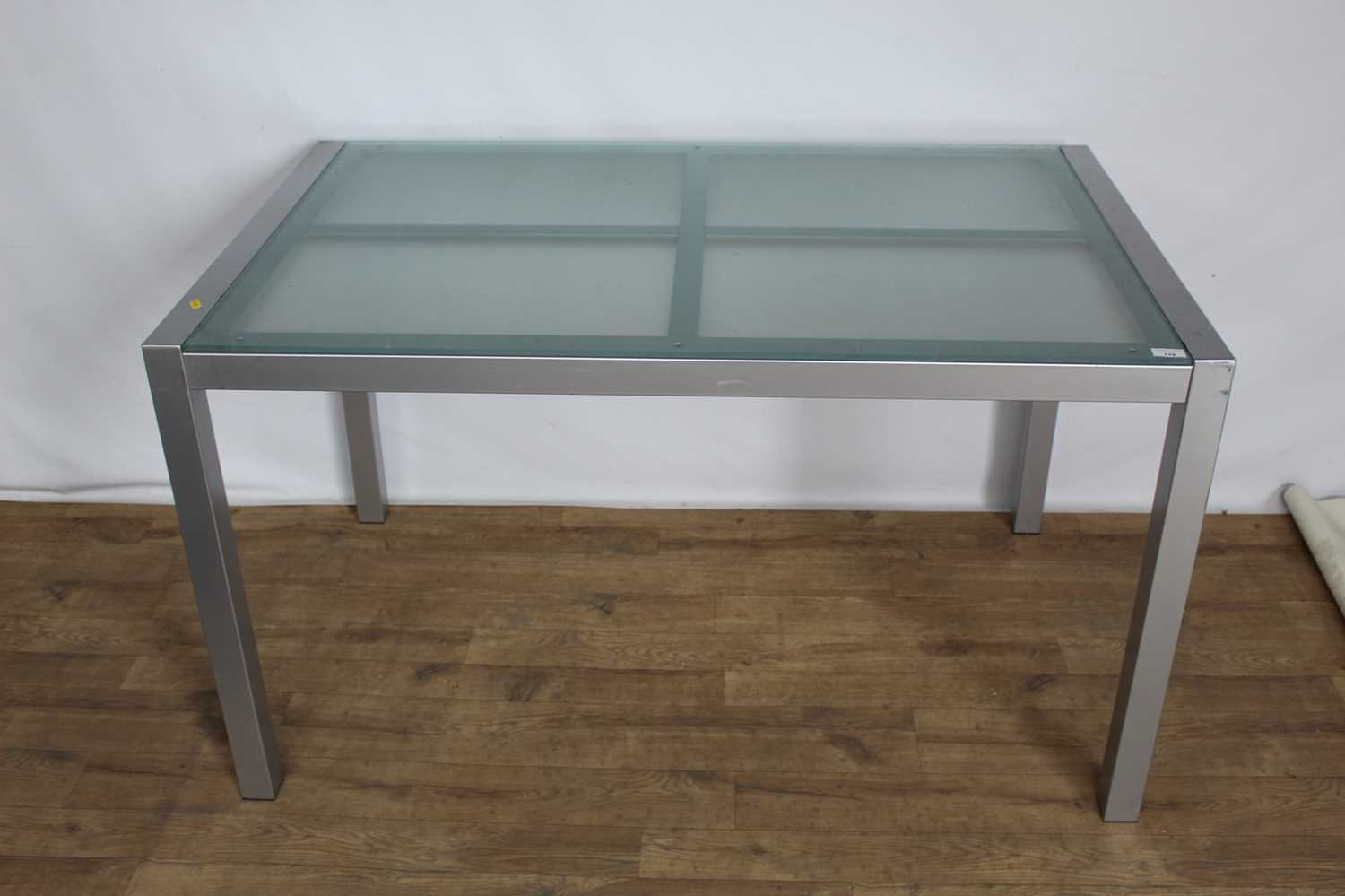 Lot 119 Contemporary glass and metal dining table,