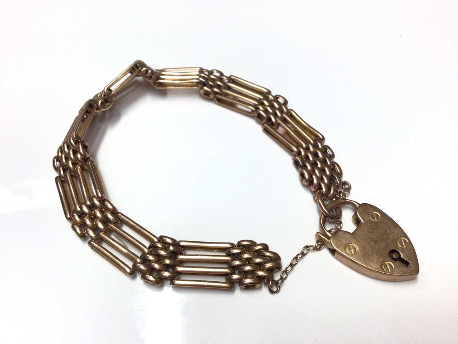 Lot 52 - Edwardian 9ct rose gold bracelet with padlock clasp