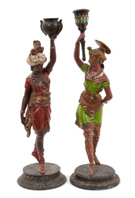 Lot 947 - Pair of 19th century cold painted spelter figural candlesticks, in the form of Africa and America