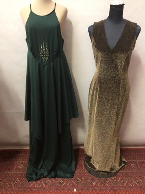 Lot 2100 - Evening dresses including black wool by Bill Gibb, full length gown with paste stones to neckline Mollie Parnis for Herbert Emmanuel, Simon Ellis green 1970's layered gown, David Butler gold lurex...