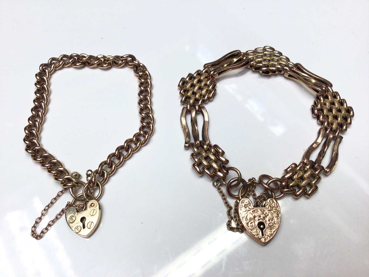 Lot 60 - Two 9ct gold bracelets with padlock clasps