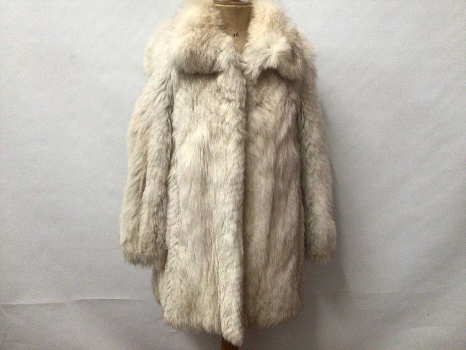 Lot 2104 - Arctic fox fur coat and a Selfridges Astrakan coat.