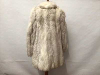 Lot 2104 - Arctic fox fur coat and a Selfridges Astrakan coat.