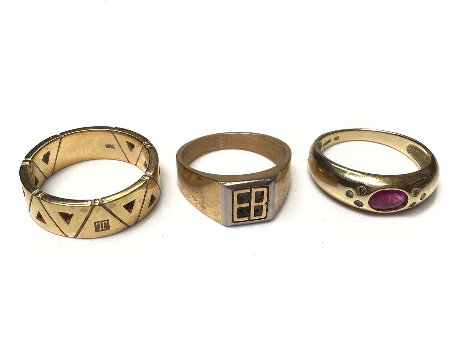 Lot 68 - Two gold rings (stamped 750) and gold gem set ring (stamped 585)