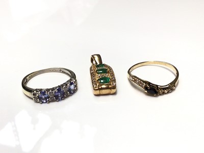 Lot 78 - 14ct gold synthetic emerald and diamond pendant, 14ct white gold diamond and tanzanite ring and 14ct god gem set ring