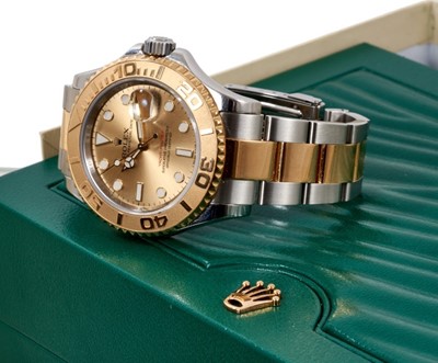 Lot 607 - Gentlemen’s Rolex Yacht-Master Oyster Perpetual Date gold and stainless steel wristwatch, with champagne dial, model 16623, 78763, serial number 8G738562. With box, papers, original tag and extra l...