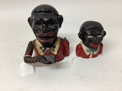 Lot 2421 - Early 20th century cast iron mechanical novelty money box/bank in the form of a gentleman in a red jacket with white collar, moveable arm, tongue and eyes, base plate missing, 17cm overall height,...