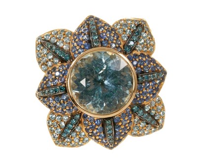 Lot 477 - Aquamarine and gem-set flower ring