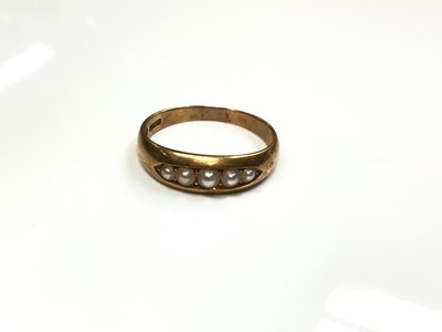 Lot 99 - Edwardian 18ct gold ring with five half pearls in gypsy style setting