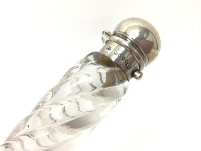 Lot 192 - Sterling silver mounted scent bottle, the glass of elongated wrythen form, hallmarked for Frederic Purnell, London 1883