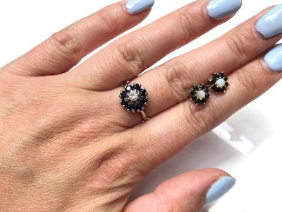 Lot 88 - 18ct white gold sapphire and diamond flower head cluster ring and pair 9ct gold sapphire and opal cluster earrings