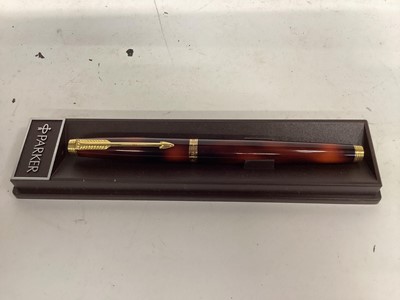 Lot 2430 - Parker 585 fountain pen with mottled orange finish, made in France, in case