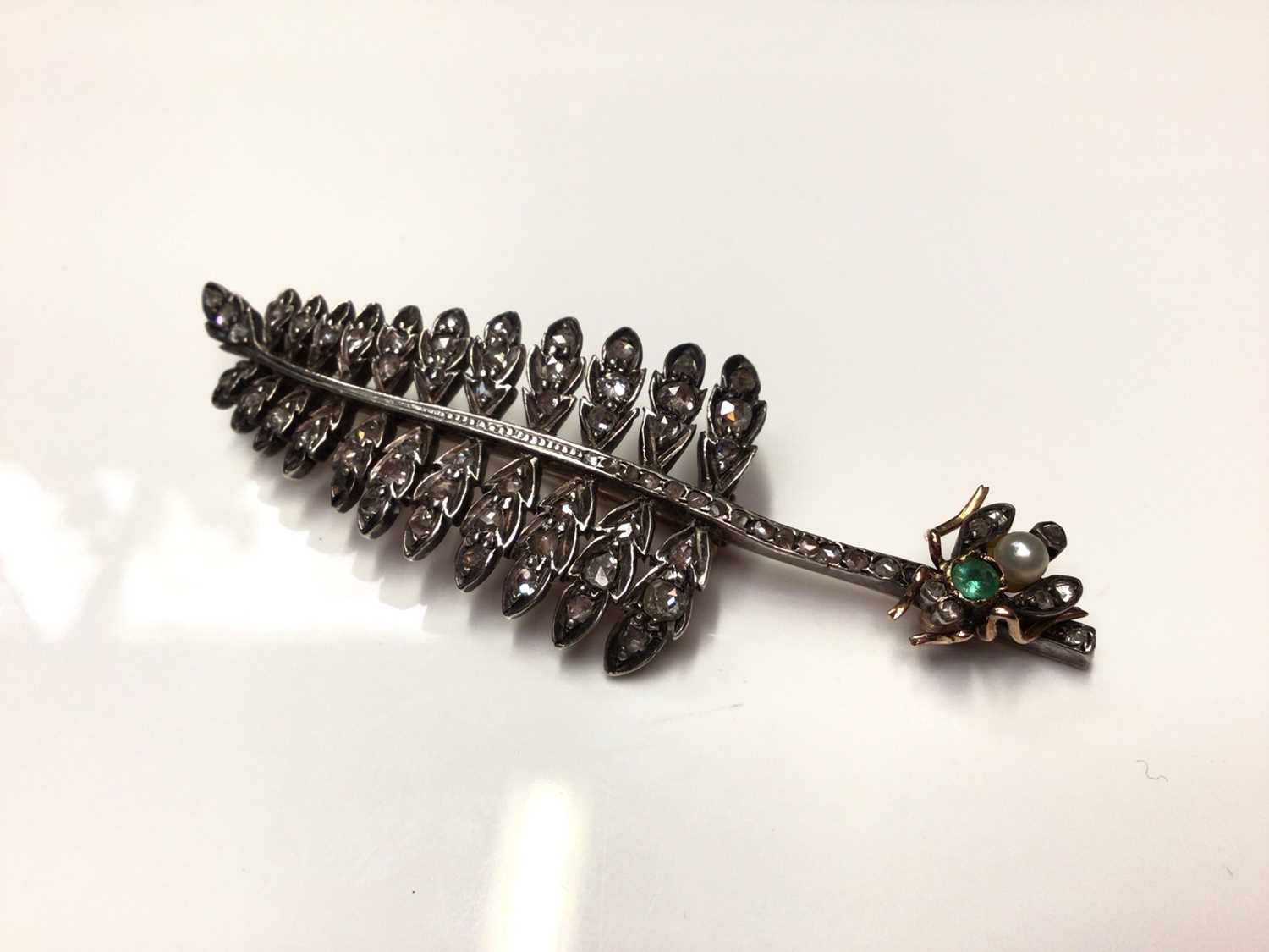 Lot 94 - Victorian rose cut diamond set brooch in the form of a fly on a fern leaf