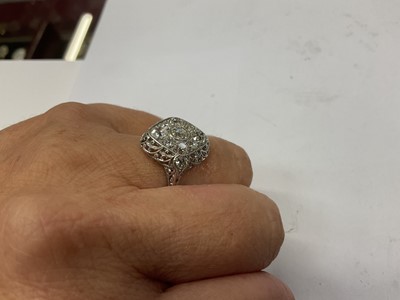 Lot 454 - Art Deco diamond cluster ring with a marquise shaped cluster of old cut diamonds in platinum setting with finely pierced gallery and shoulders on platinum shank