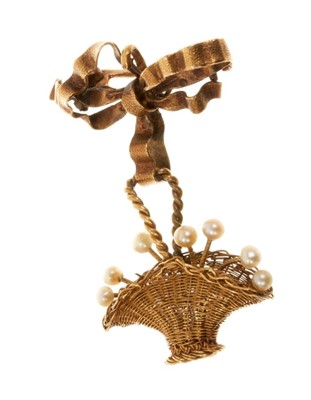 Lot 474 - 19th century gold and seed pearl brooch in the form of a finely woven gold basket holding seed pearl flowers, suspended from a gold bow.