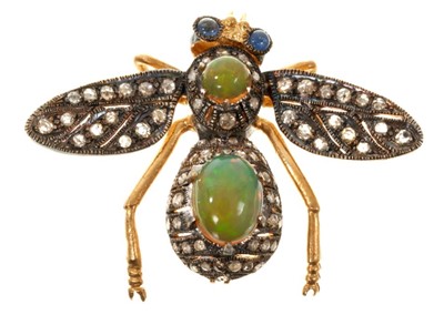 Lot 511 - Victorian style diamond and opal novelty 'Bee' brooch with cabochon sapphire eyes, the body with two opal cabochons and pavé set rose cut diamonds in silver gilt setting.