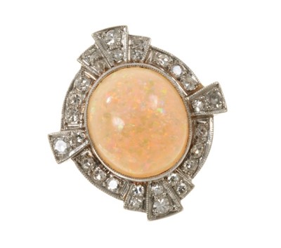 Lot 513 - Art Deco style opal and diamond cluster ring with an oval cabochon opal surrounded by a border of diamonds in platinum millegrain setting with pierced gold gallery on gold shank.