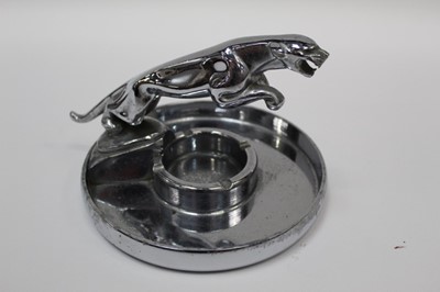 Lot 2012 - Impressive 1950s Jaguar promotional/dealership chrome ashtray, with leaping Jaguar mascot, base 17cm in diameter.