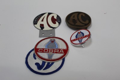 Lot 2014 - Vintage chrome and enamel AC cars owners club badge, together with other AC and Cobra badges (5).