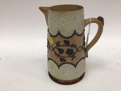 Lot 1092 - Doulton Slaters Patent stoneware jug with incised floral band on brown and buff ground, impressed marks to base, 20cm high