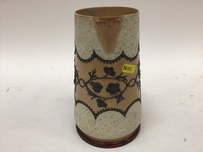 Lot 1092 - Doulton Slaters Patent stoneware jug with incised floral band on brown and buff ground, impressed marks to base, 20cm high