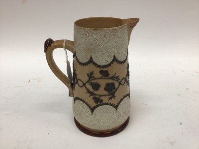 Lot 1092 - Doulton Slaters Patent stoneware jug with incised floral band on brown and buff ground, impressed marks to base, 20cm high