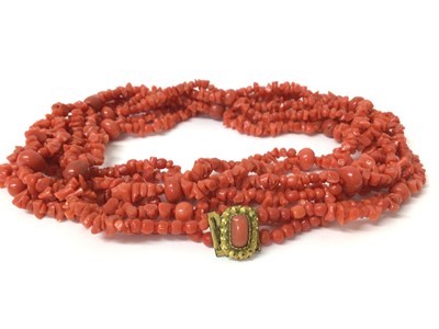 Lot 104 - Antique coral double strand necklace with Georgian gilt metal clasp, 145cm long