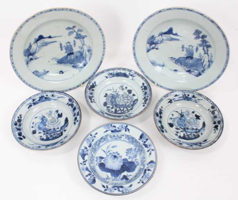 Lot 39 - Four 18th Chinese export blue and white pudding bowls and two plates