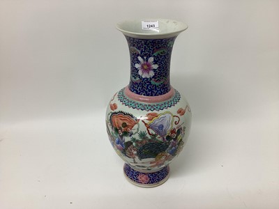 Lot 1243 - Chinese polychrome baluster vase