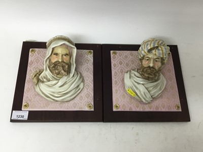 Lot 1230 - Pair French porcelain Arabian head plaques