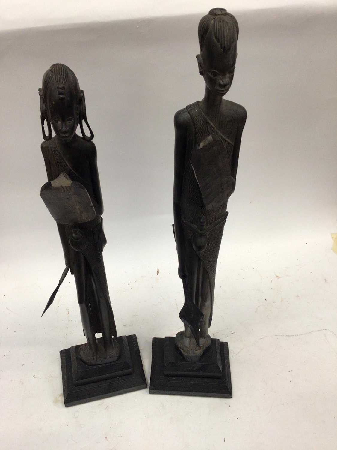 Lot 2547 - Two carved African figures