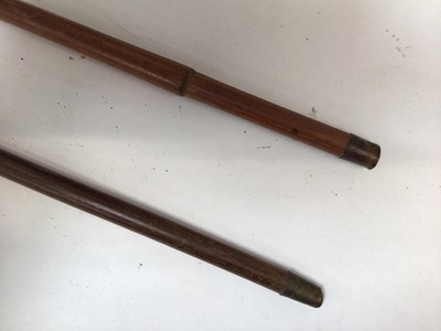 Lot 739 - Military interest- Gentleman's bamboo walking cane by Brigg with 9ct gold mount engraved 'C.E.P. Guards Club' together with a walking stick with horn grip and silver collar (2)