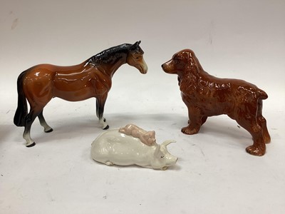 Lot 1104 - Selection of Beswick animals including Pig with piglet on it's back, Foals, Blue Tit, Owl and other animal ornaments (9)