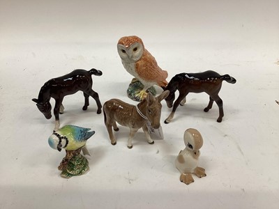 Lot 1104 - Selection of Beswick animals including Pig with piglet on it's back, Foals, Blue Tit, Owl and other animal ornaments (9)