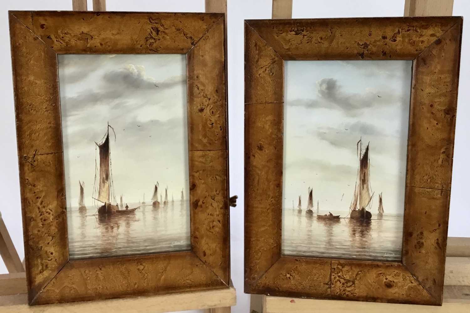 Lot 184 - R. Cavallos, 20th century, pair of oils on board - shipping at anchor, signed, 19cm x 11cm, in maple veneered frames