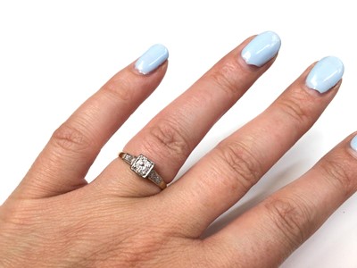 Lot 132 - Diamond single stone ring with diamond set shoulders