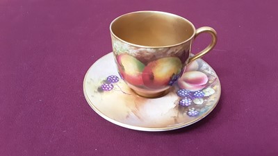 Lot 1132 - Royal Worcester cabinet cup and saucer with hand painted fruit decoration, signed Rushton and Everitt