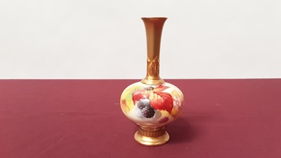 Lot 1135 - Royal Worcester slender neck vase with hand painted berry and leaf decoration, signed K Blake, 15cm high