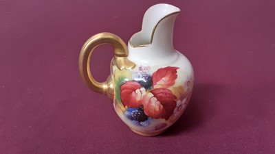 Lot 1137 - Royal Worcester jug with hand painted berry and leaf decoration, signed K Blake, 10.5cm high