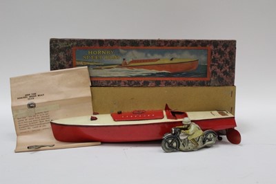 Lot 1821 - Schuco Sport Tinplate motorcycle and rider, together with a Hornby Speed Boat in box