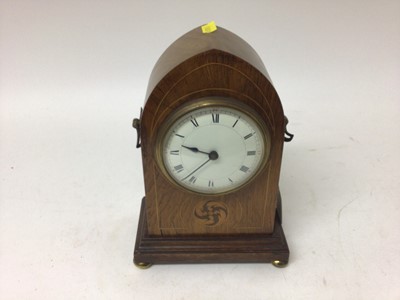 Lot 2452 - Edwardian inlaid mahogany mantel clock, the domed case with twin brass handles, 23cm high