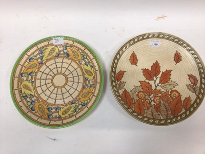 Lot 1159 - Charlotte Rhead circular charger decorated with autumn leaves, 32cm diameter together with another