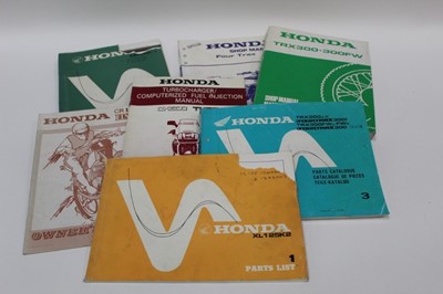 Lot 2047 - Group of 1980s and early 1990s Honda motorcycle and ATV dealership training manuals, parts catalogues and workshop manuals (1 box)